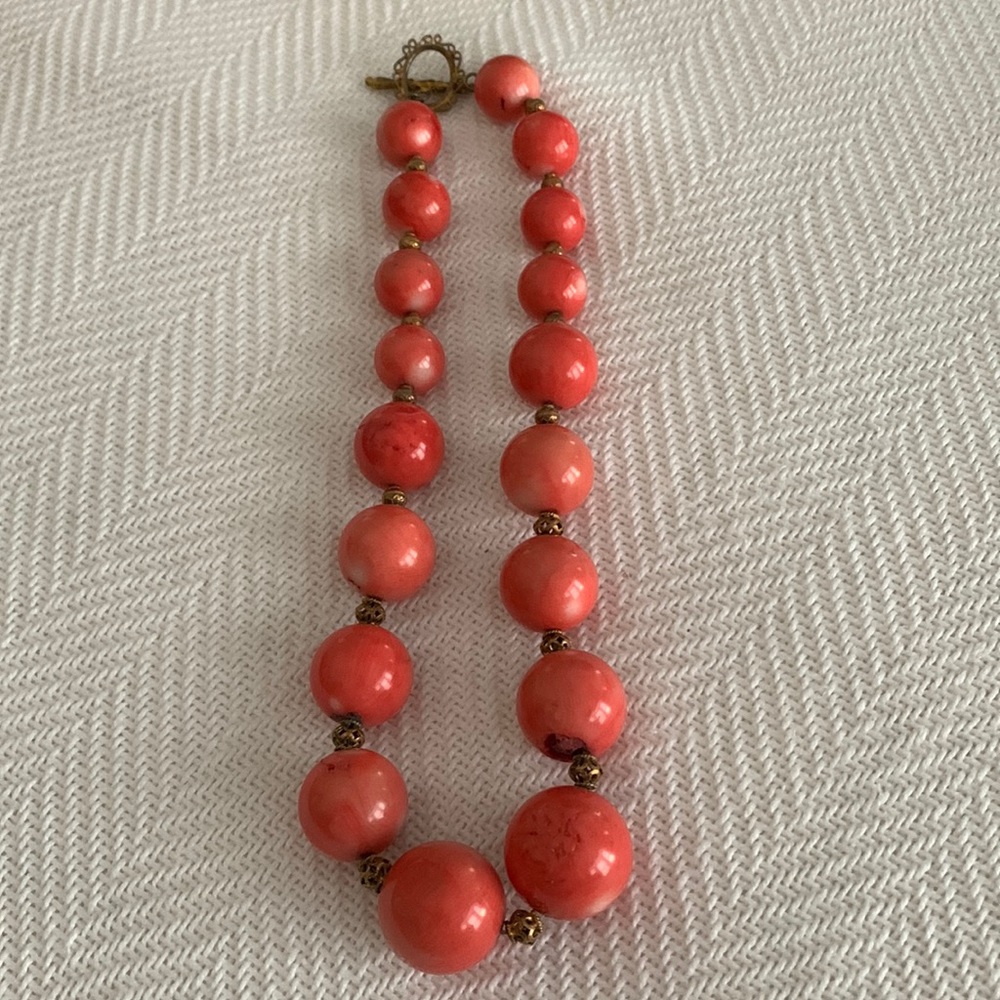 Large Beaded Coral Necklace with a Bronze Clasp.